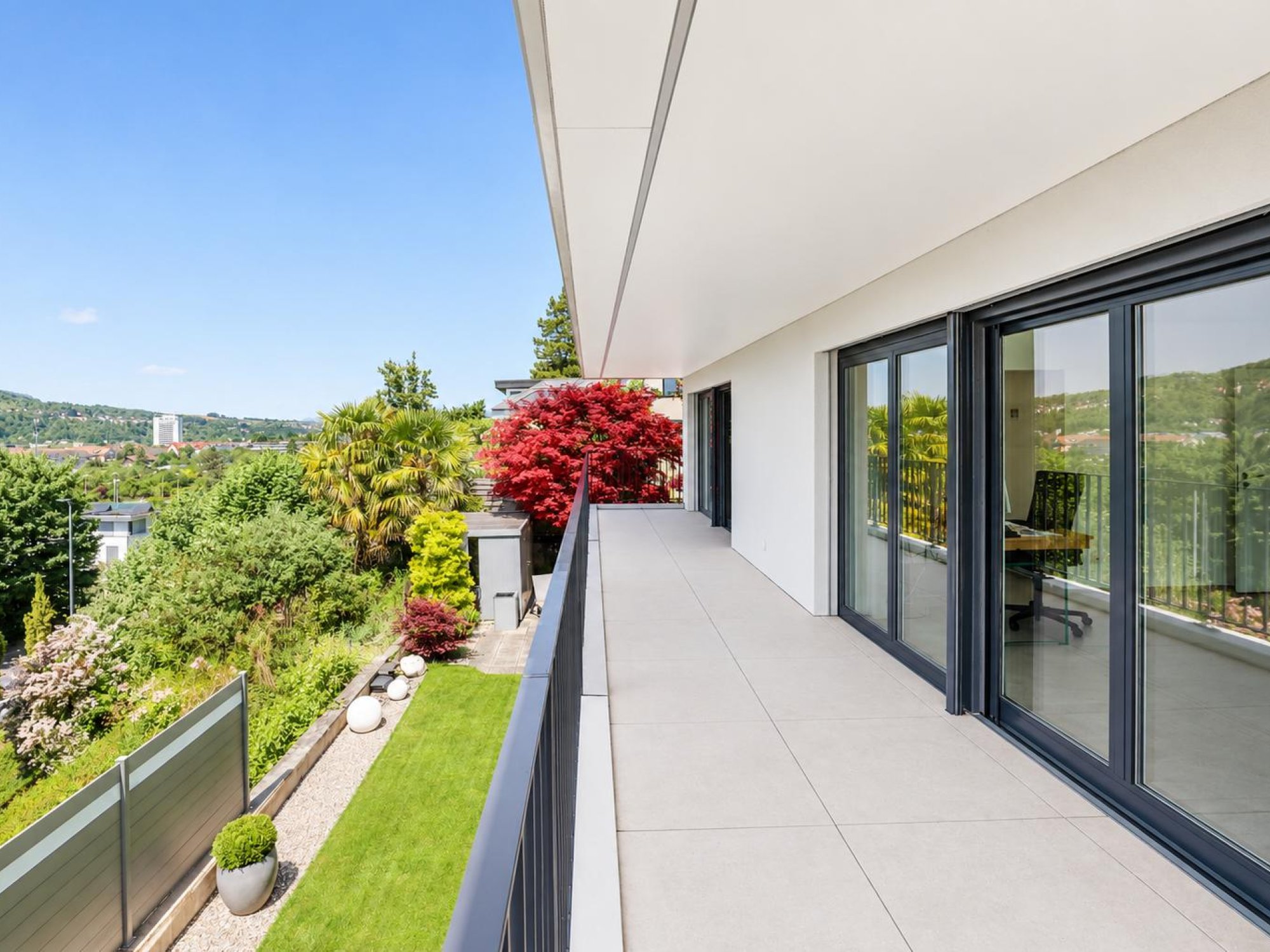 Gedeckter Balkon im Obergeschoss