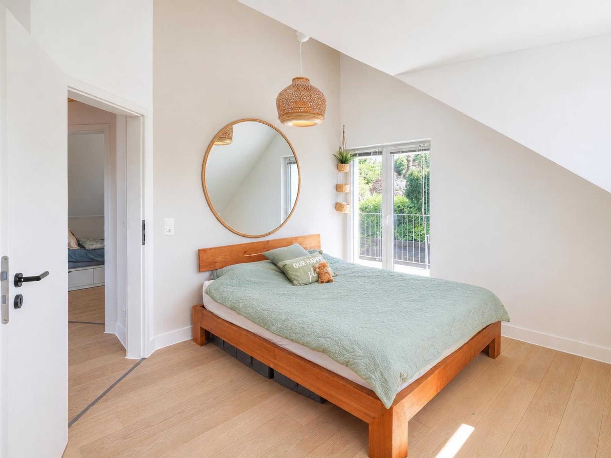 Schlafzimmer mit Balkonzugang